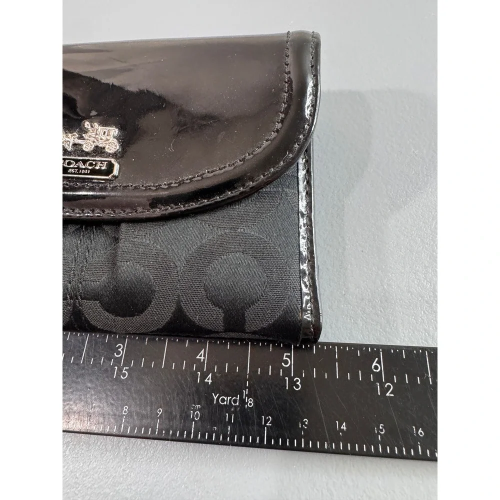 Coach Trifold Wallet Womens Black Signature Canvas Patent Leather Logo Plate